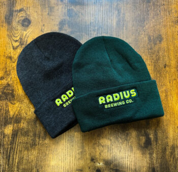 Radius branded cuffed beanies colors Forest and Heather Charcoal.